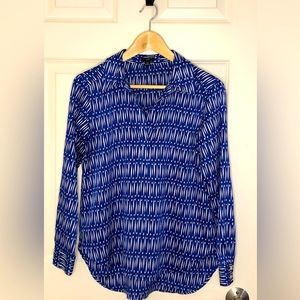 Nautical design can dress up or down. Wrinkle free and easy to go with anything.